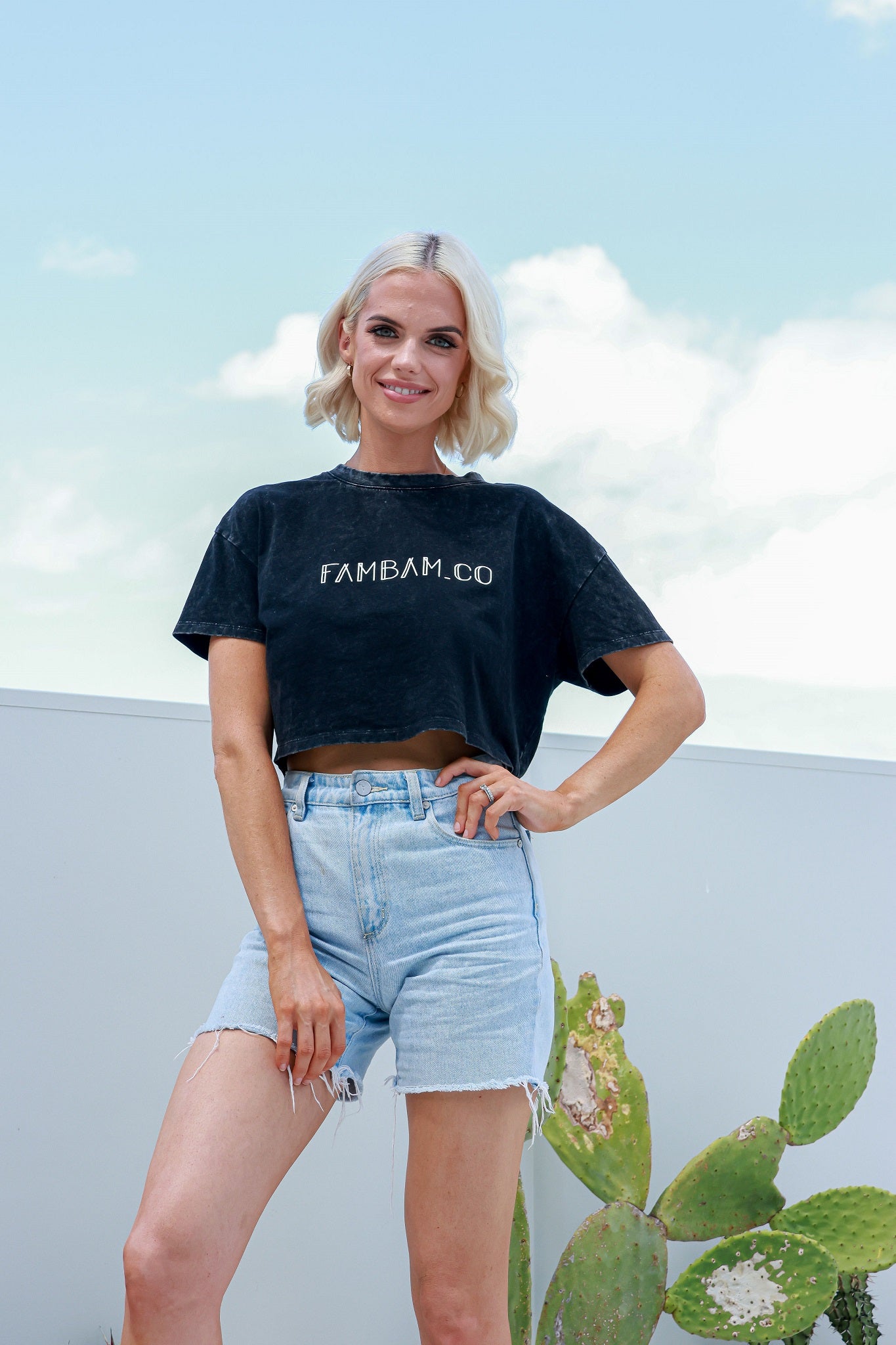 Woman in acid wash crop top and shorts