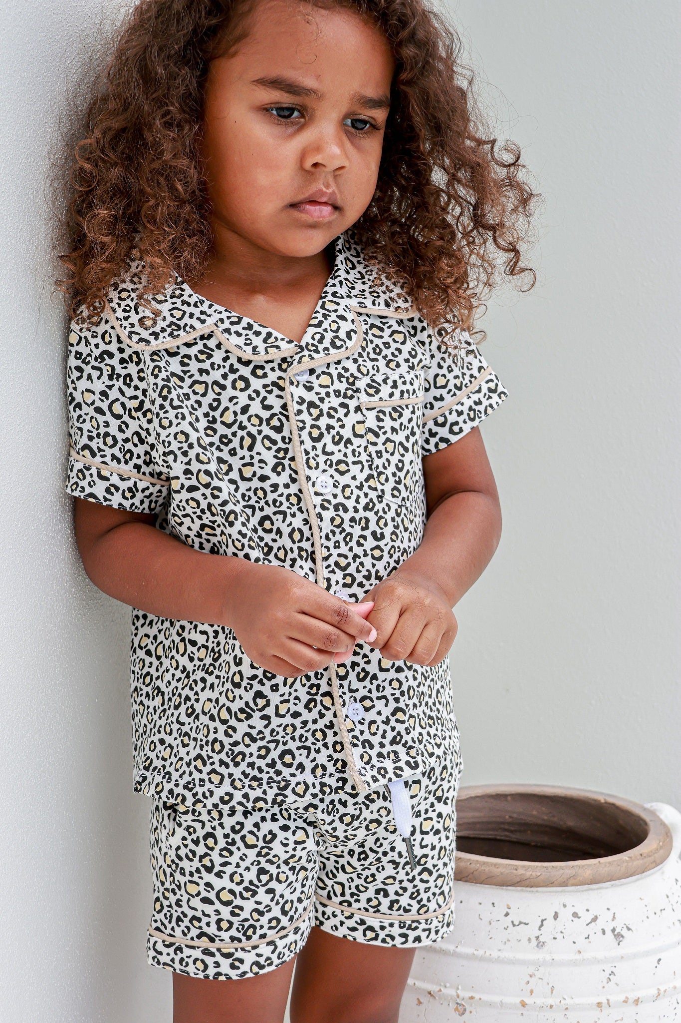 Toddler girl wearing leopard print pyjama set